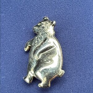 vintage gold-tone bear pin brooch, signed Direction One.